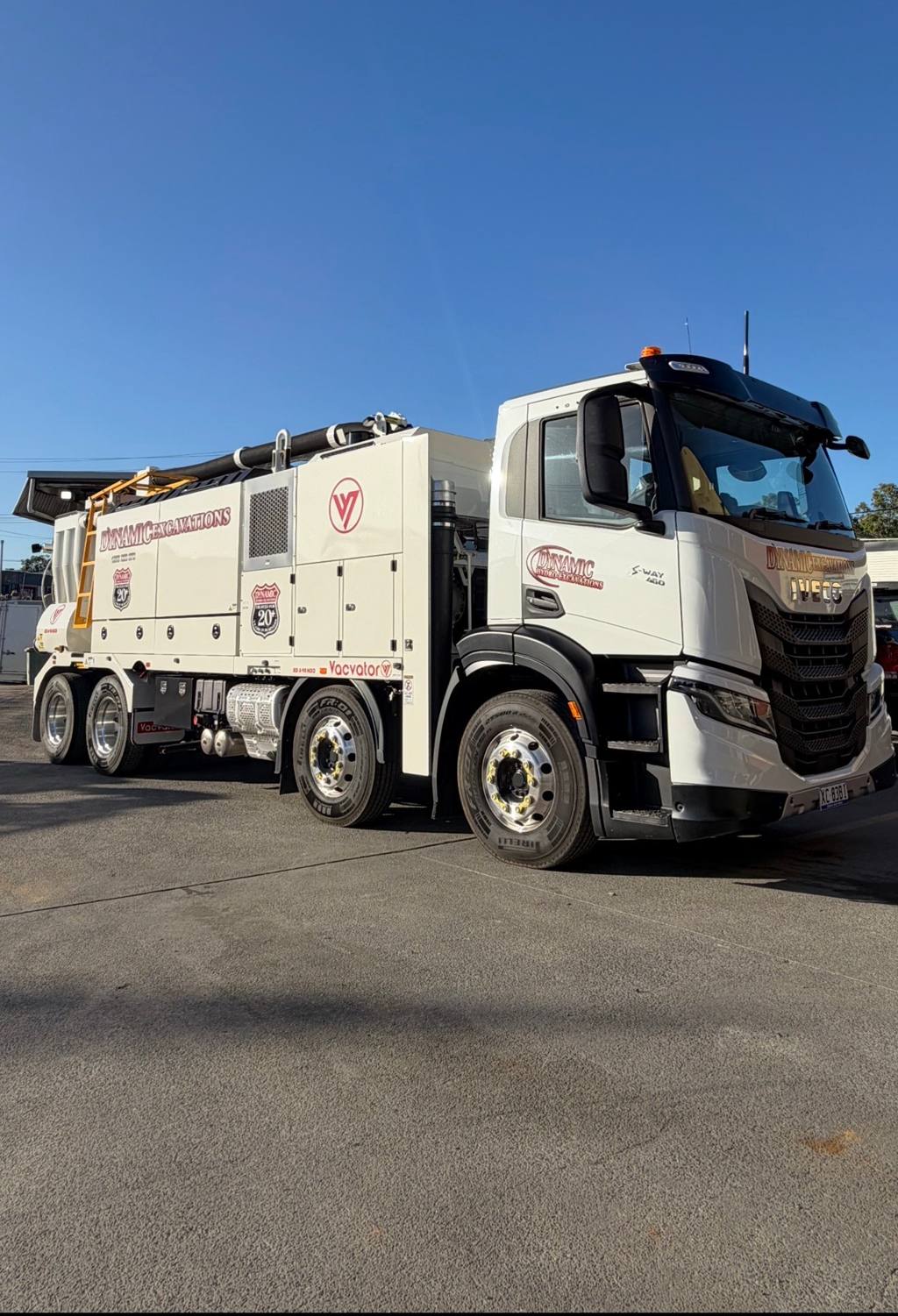 Dynamic Graphics door decals and signwritten body panels fitted to a commercial vacuum truck
